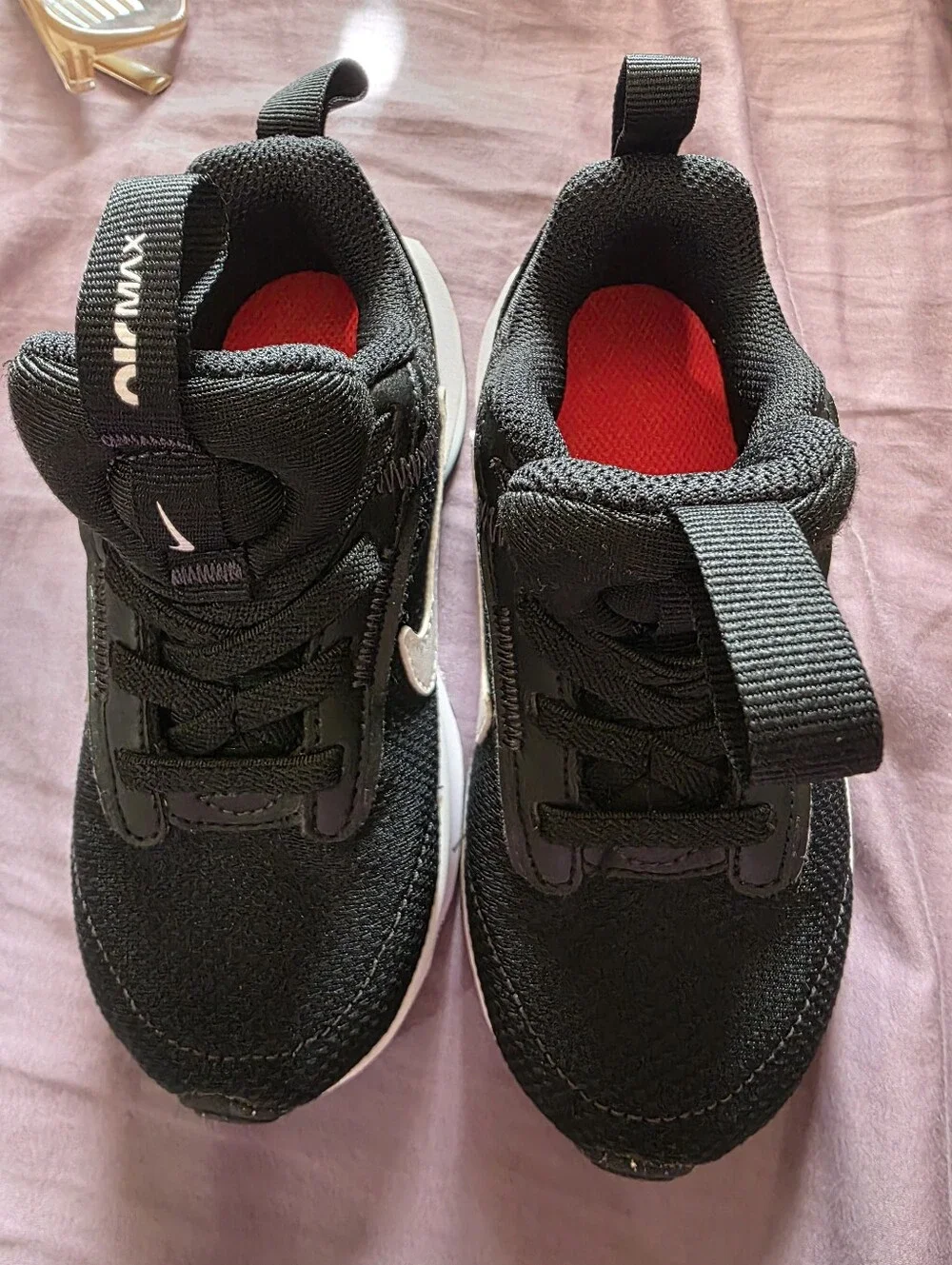 Nike Kids Black Sneakers with White Sole and Small Pink Swoosh